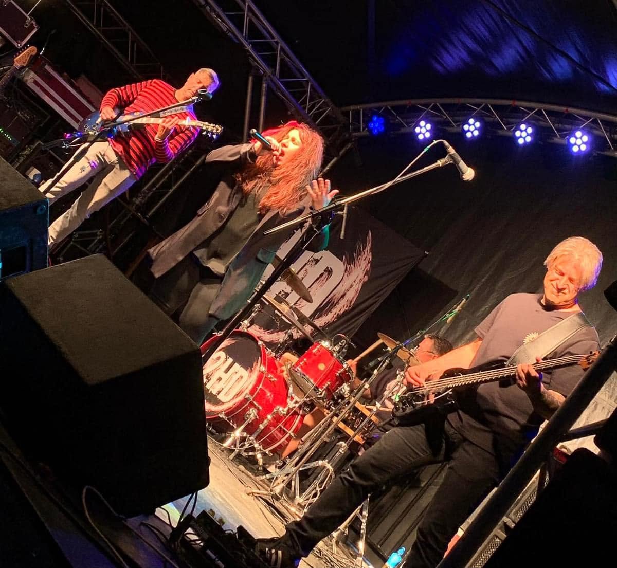 2HD playing a lively indoor show in front of the crowd