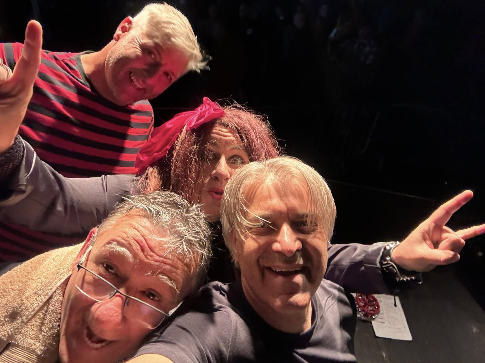 The four members of 2HD together backstage after a live show